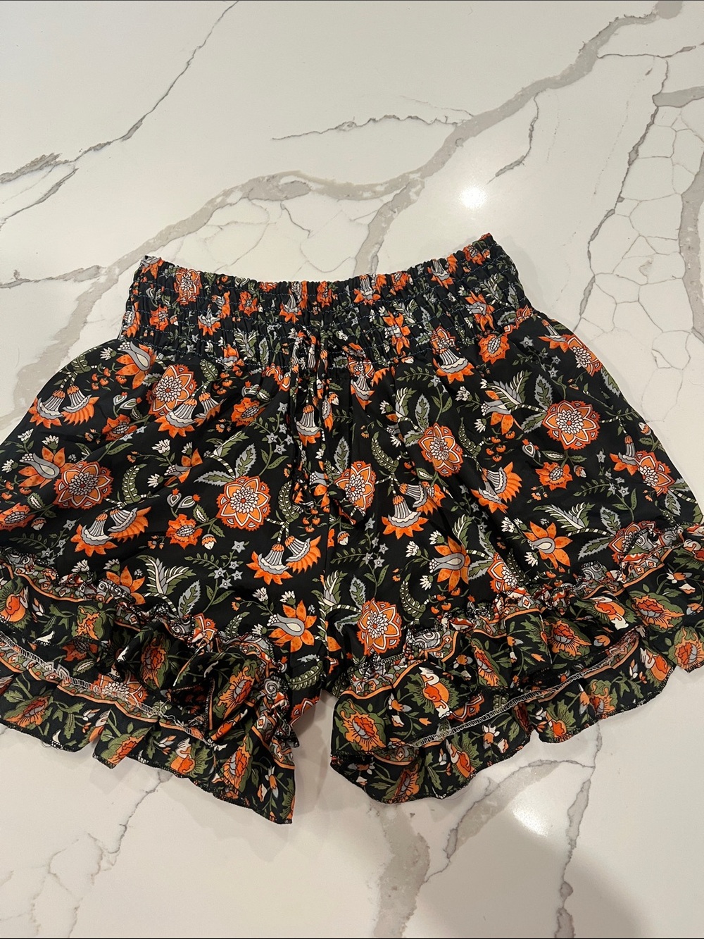 India Boutique Black Floral Ruffle High-Waist Shorts with Orange & Green Print